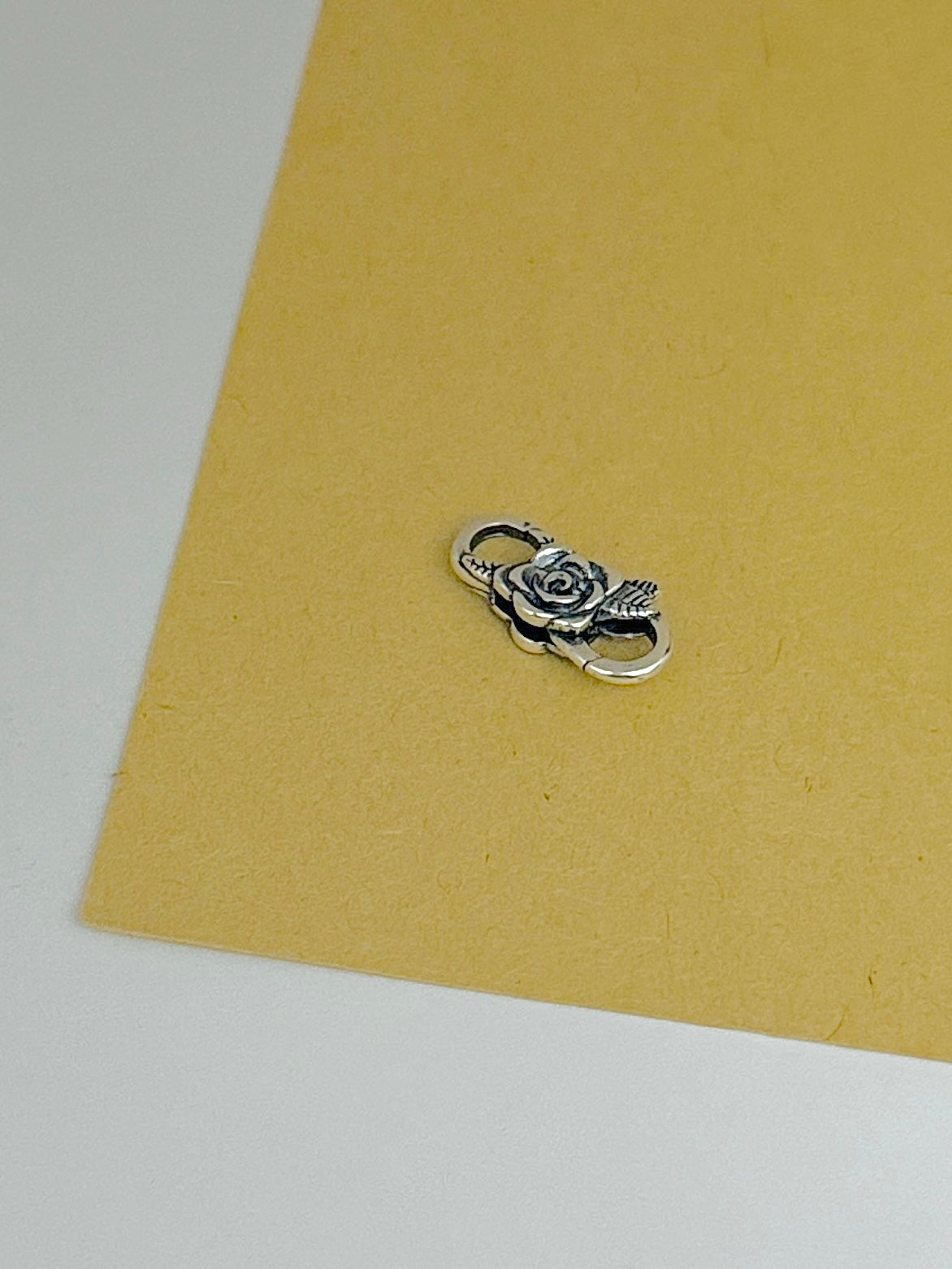 Broche rosa infinito