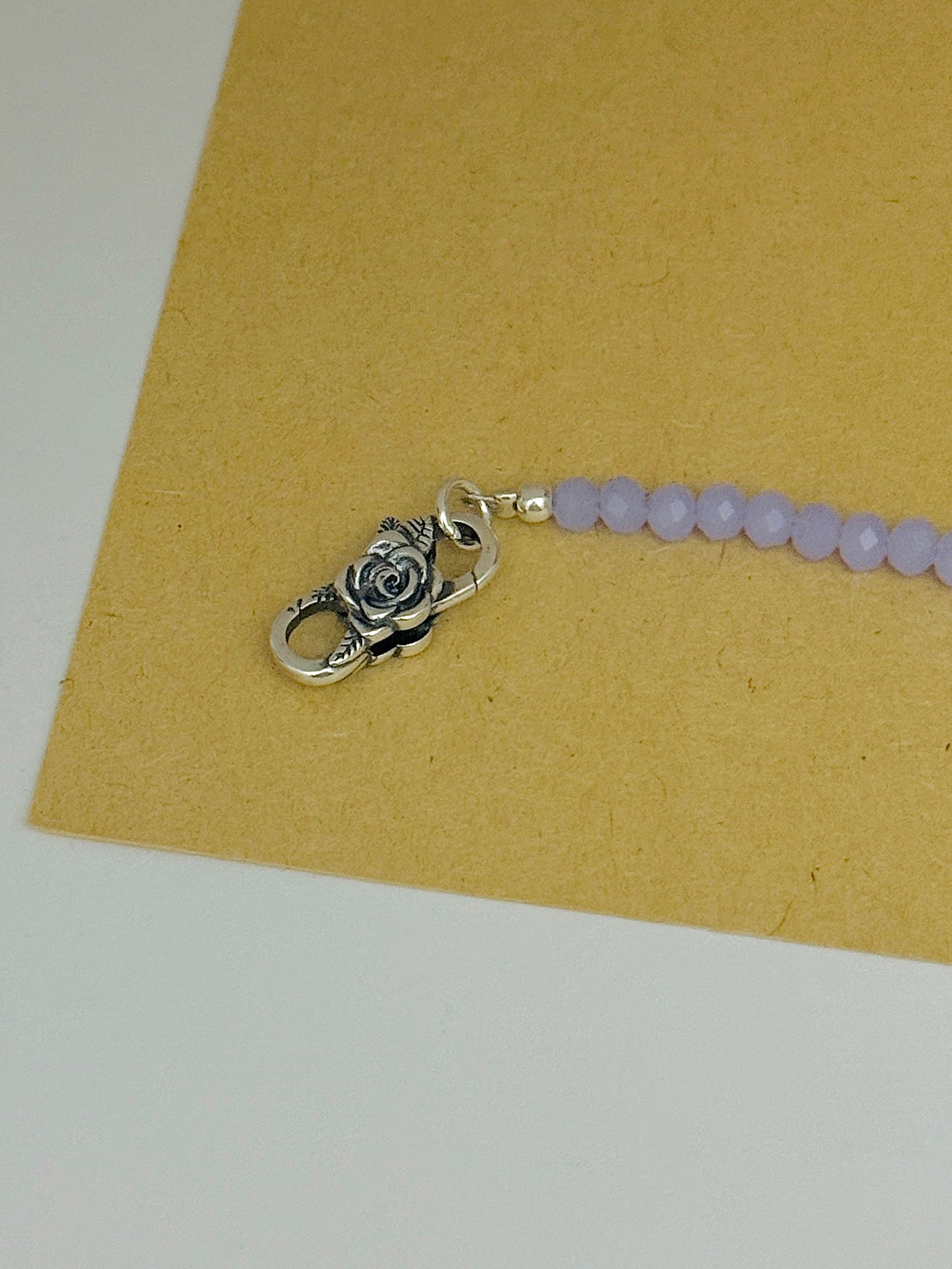 Broche rosa infinito
