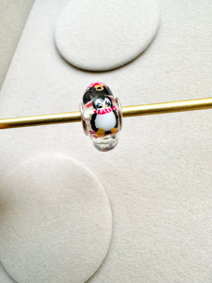 Charm Pingüinos y esferas