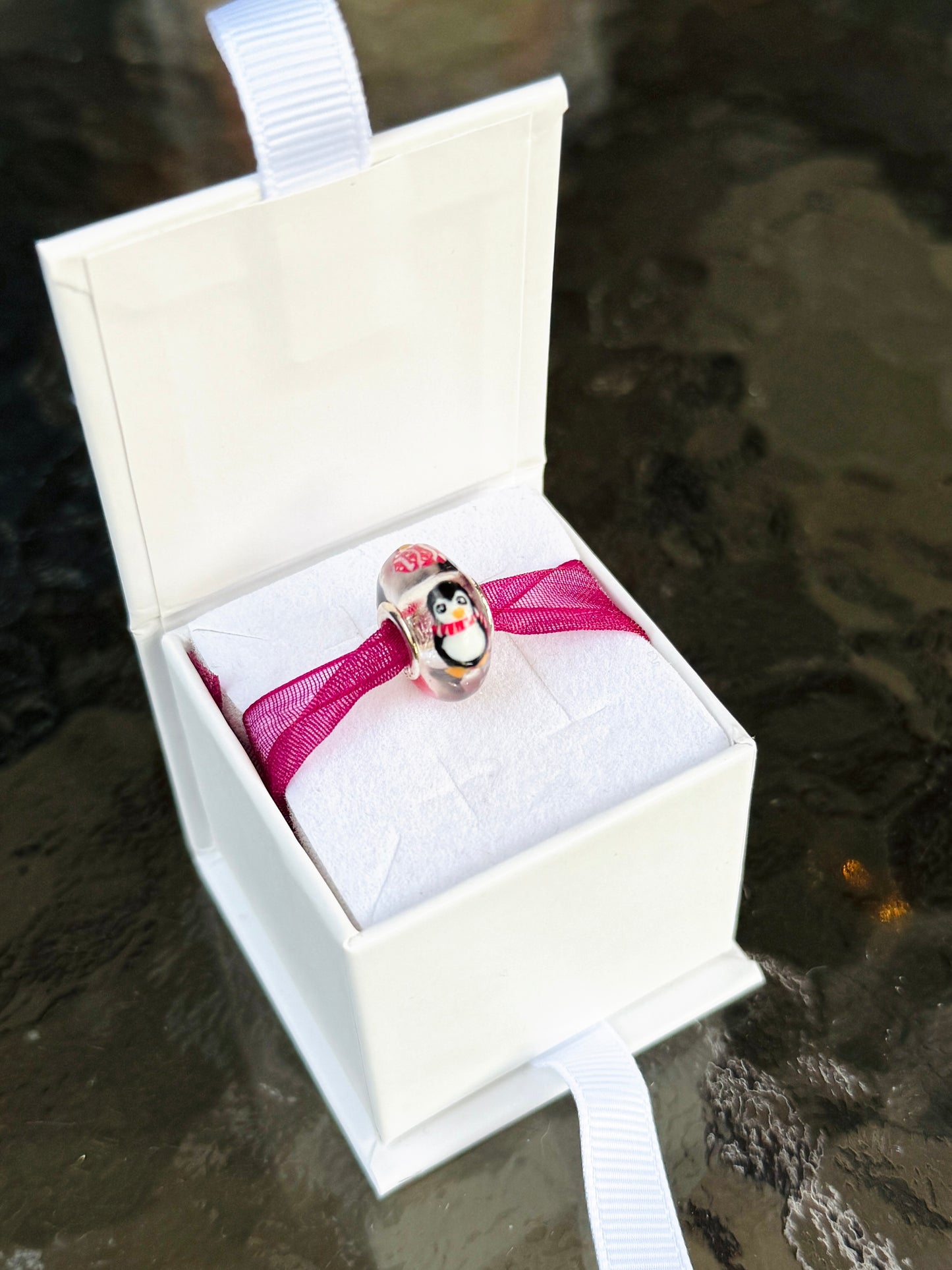 Charm Pingüinos y esferas