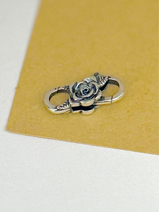Broche rosa infinito