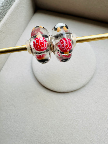 Charm Pingüinos y esferas