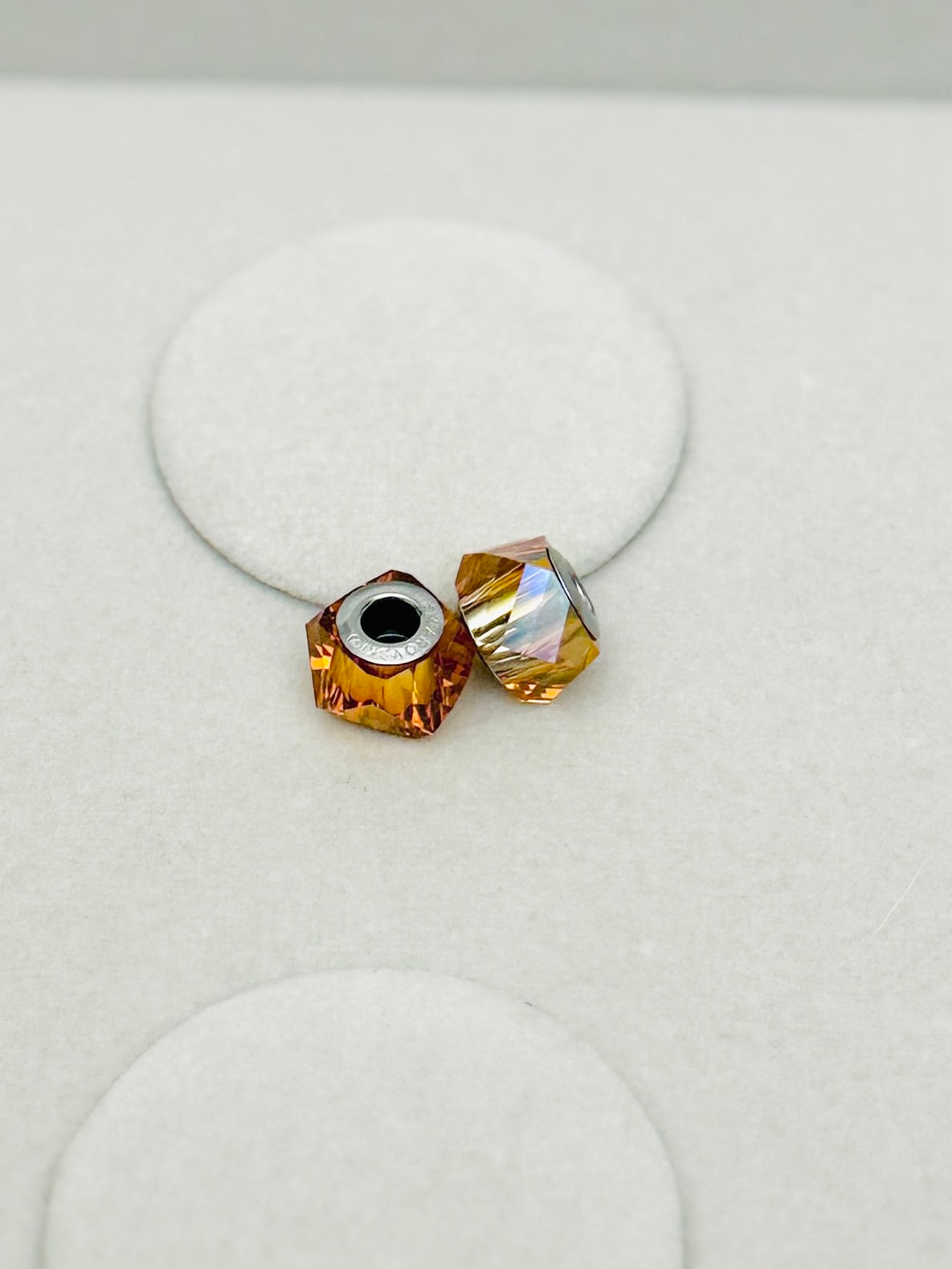 Pair of Swarovski Faceted Iridescent Ochre
