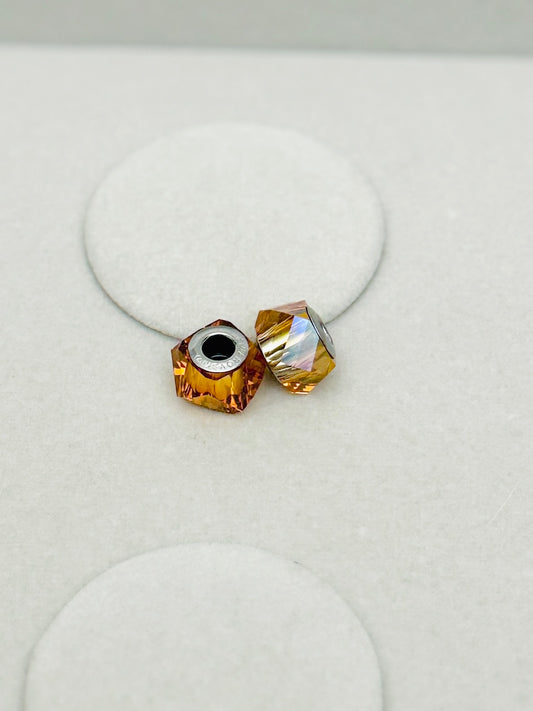 Pair of Swarovski Faceted Iridescent Ochre